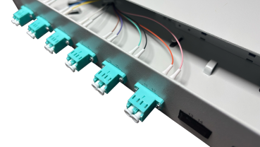 Preview: OV-06xLC-D OM3 19 Zoll Spleissbox 6xLC-D OM3 1HE/12/gr CSH 12Pgt 50/125 6Kup aqua